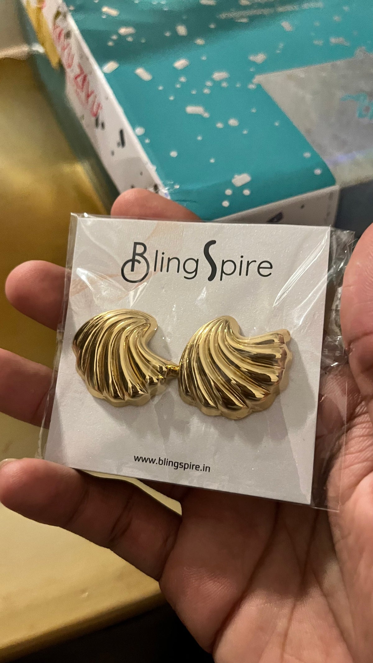 Golden Seashell Swirl Stud Earrings: A Coastal Chic Statement