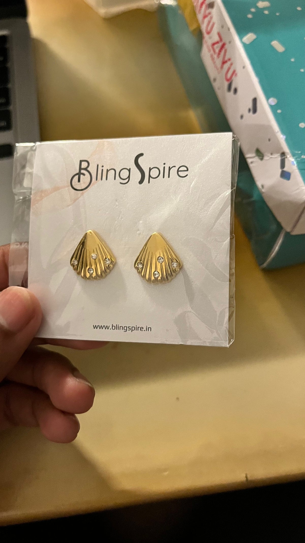 Golden Seashell Stud Earrings with Cubic stones