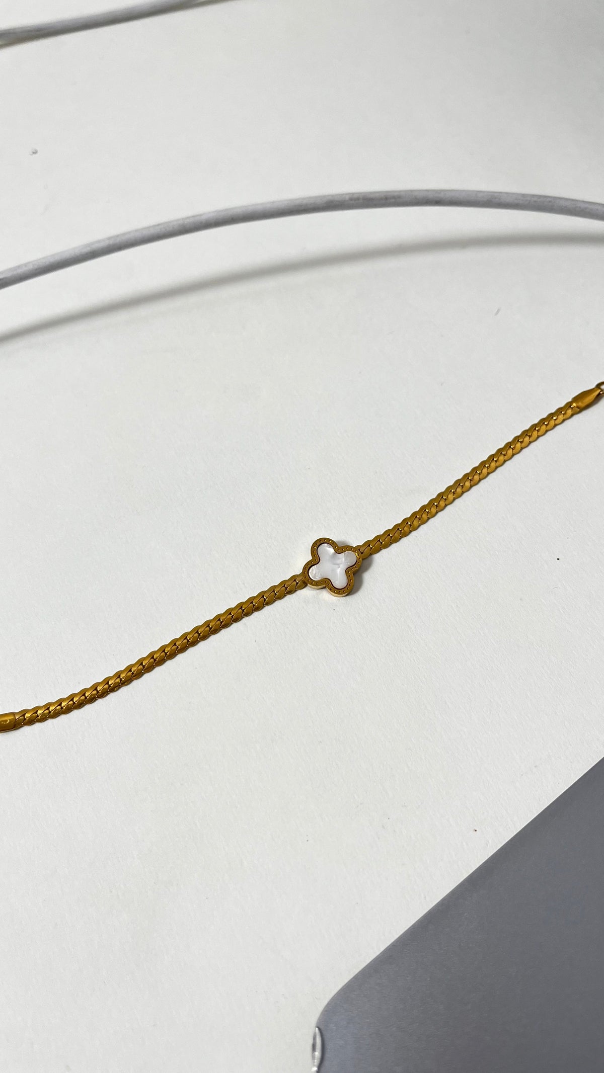 Clover Charm: Gold-Tone Chain Bracelet