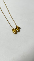 Minimalist Magic: Gold-Tone Pebble Necklace