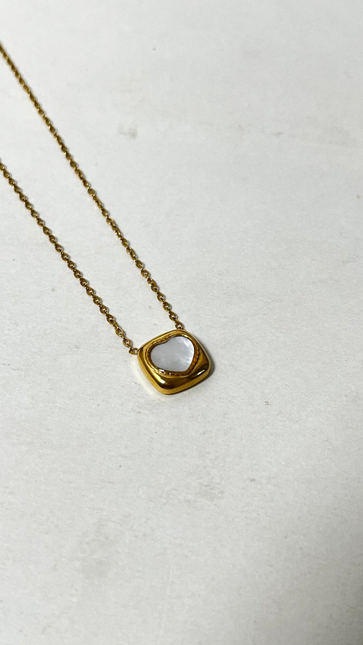 Shimmering Heart: Gold-Tone Pendant Necklace