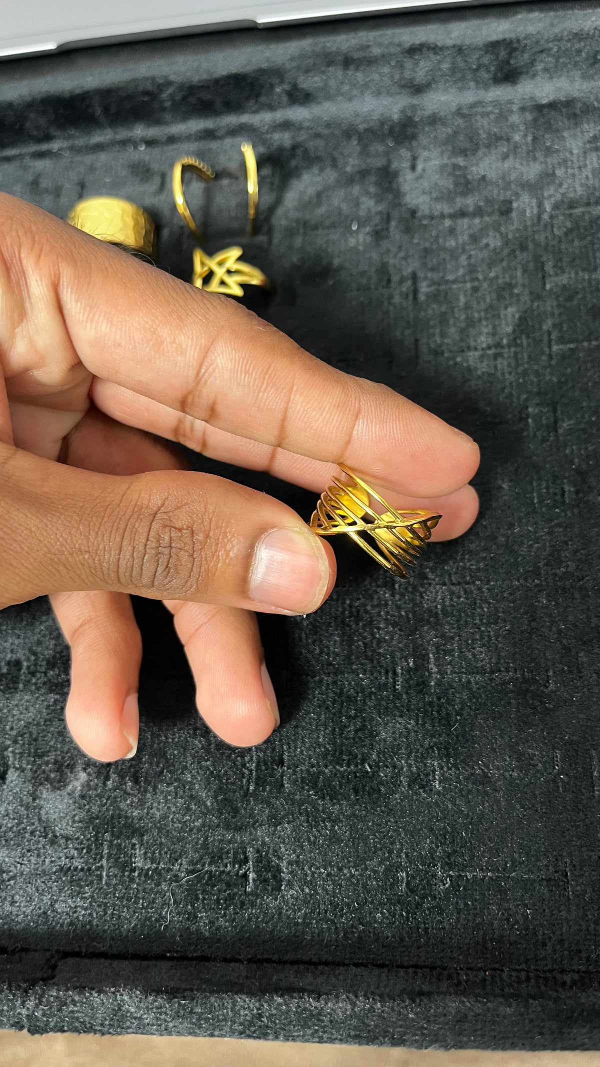 Intertwined Elegance: Gold-Tone Interlocking Ring