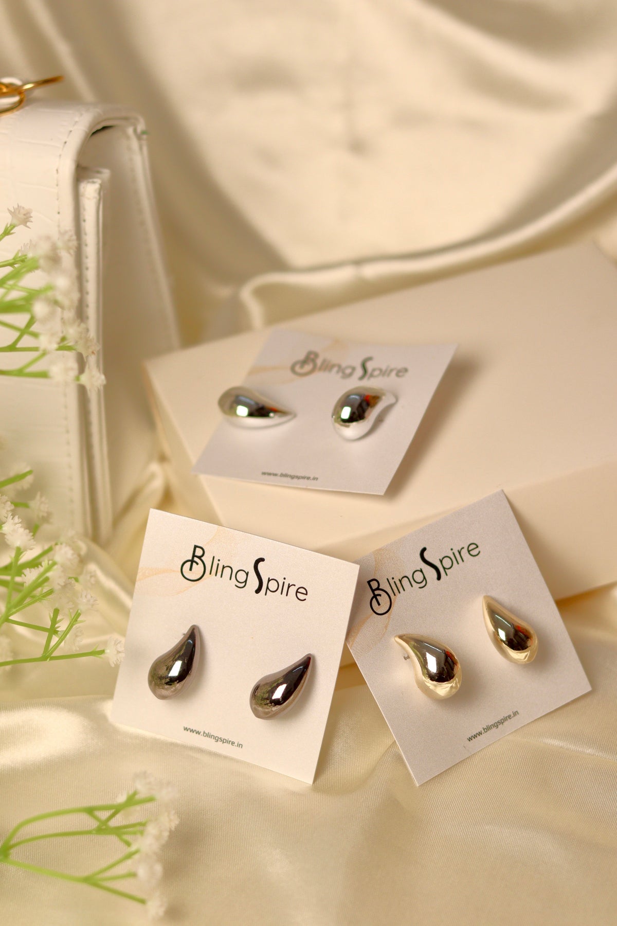 Lustrous Teardrop Metallic Stud Earrings